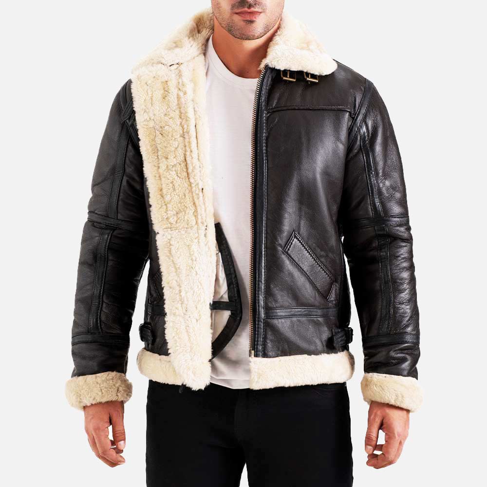 Black leather jacket with white fur lining worn by a person on a light gray background